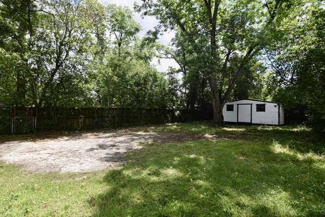 2320 Henry Cir, Augusta, GA 30906 - view of yard with a storage unit and an outbuilding