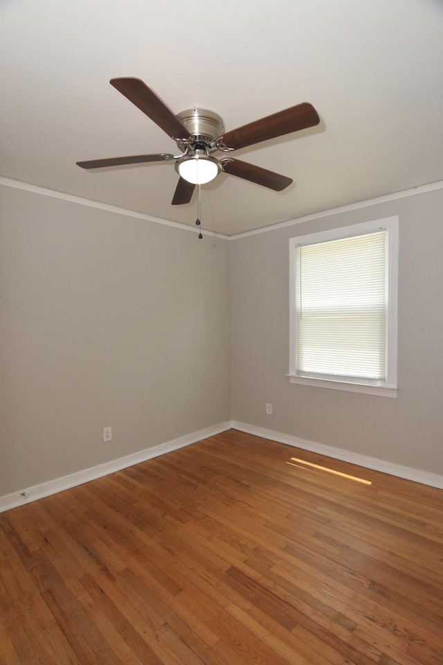2320 Henry Cir, Augusta, GA 30906 - spare room featuring ornamental molding, baseboards, wood finished floors, and ceiling fan