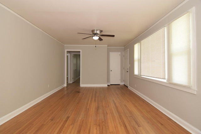 2320 Henry Cir, Augusta, GA 30906 - spare room featuring a ceiling fan, light wood-style floors, baseboards, and crown molding