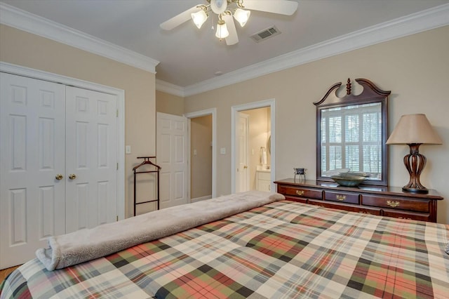 bedroom featuring ornamental molding, ceiling fan, a closet, and ensuite bath