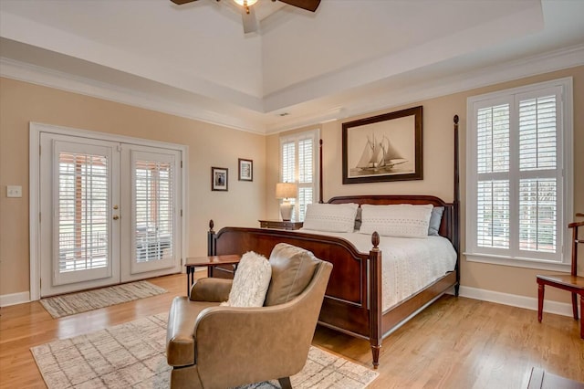 bedroom with access to outside, french doors, light hardwood / wood-style floors, ceiling fan, and ornamental molding