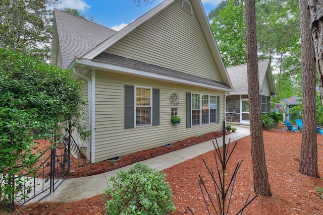 901 Patriots Pt, Mccormick, SC 29835 - view of side of property with a sunroom, roof with shingles, and crawl space