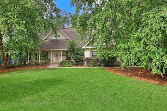 901 Patriots Pt, Mccormick, SC 29835 - view of front of home with a front yard, roof with shingles, and a porch