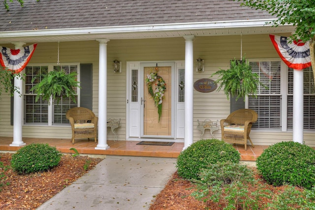 901 Patriots Pt, Mccormick, SC 29835 - view of exterior entry with covered porch and a shingled roof
