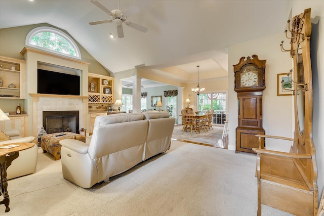 901 Patriots Pt, Mccormick, SC 29835 - carpeted living room featuring a ceiling fan, a fireplace, lofted ceiling, and a chandelier