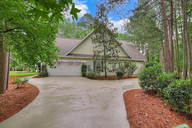 901 Patriots Pt, Mccormick, SC 29835 - view of front of home featuring roof with shingles, driveway, and a garage