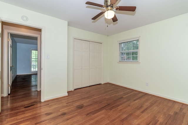 3247 Ramsgate Rd, Augusta, GA 30909 - unfurnished bedroom with wood finished floors, baseboards, a closet, and ceiling fan