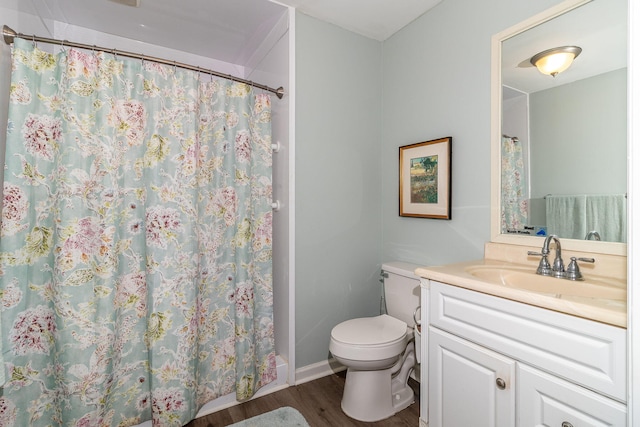 3247 Ramsgate Rd, Augusta, GA 30909 - full bath featuring wood finished floors, toilet, vanity, a shower with curtain, and baseboards