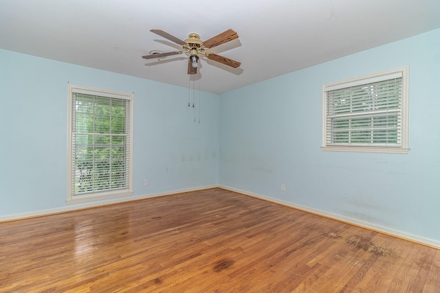 3247 Ramsgate Rd, Augusta, GA 30909 - empty room featuring wood finished floors, a ceiling fan, and baseboards