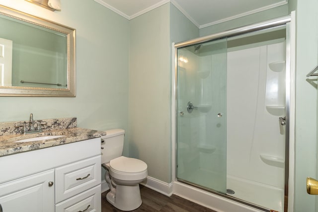 3247 Ramsgate Rd, Augusta, GA 30909 - full bath featuring ornamental molding, wood finished floors, a stall shower, baseboards, and toilet