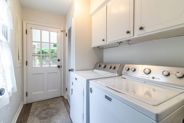 3247 Ramsgate Rd, Augusta, GA 30909 - clothes washing area with cabinet space, washer and clothes dryer, light wood-style floors, and baseboards