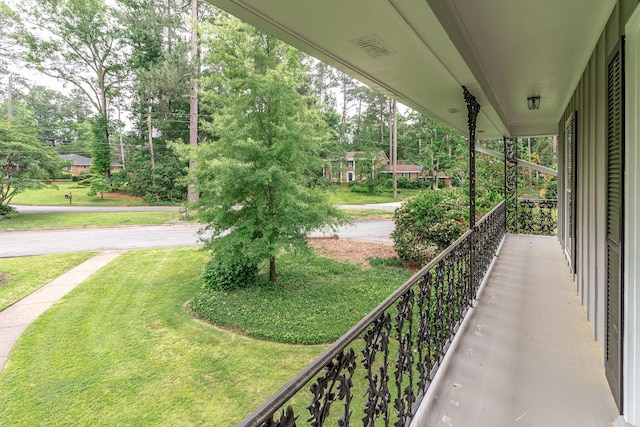 3247 Ramsgate Rd, Augusta, GA 30909 - balcony featuring a porch and view of wooded area