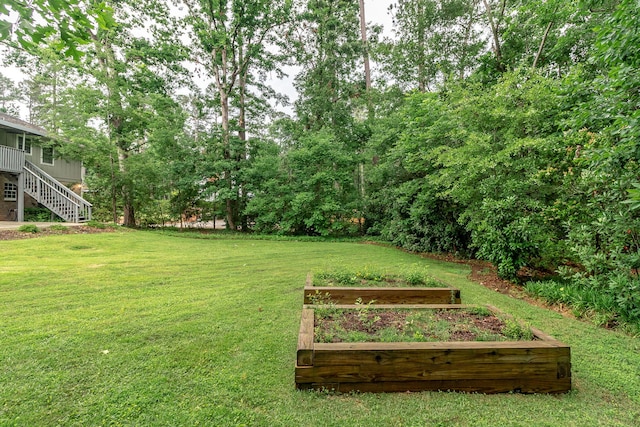 3247 Ramsgate Rd, Augusta, GA 30909 - view of grassy yard featuring a garden and stairway