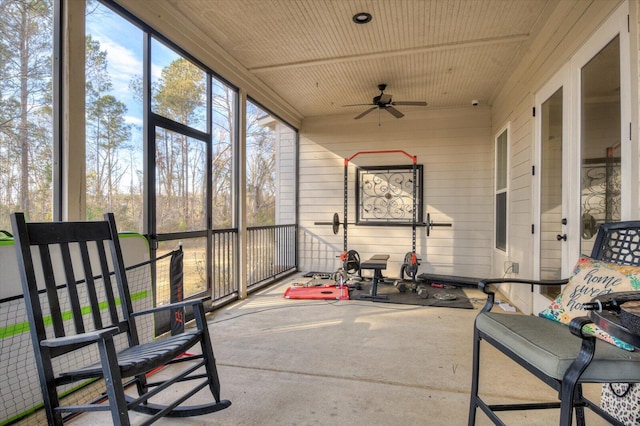 sunroom / solarium with ceiling fan