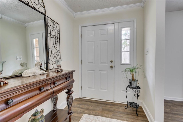 entryway featuring a wealth of natural light, crown molding, a textured ceiling, and dark wood-type flooring