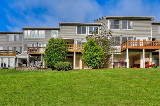 690 Riverfront Dr, Augusta, GA 30901 - back of property featuring a lawn and a deck