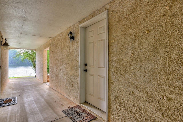 690 Riverfront Dr, Augusta, GA 30901 - property entrance with a water view and stucco siding