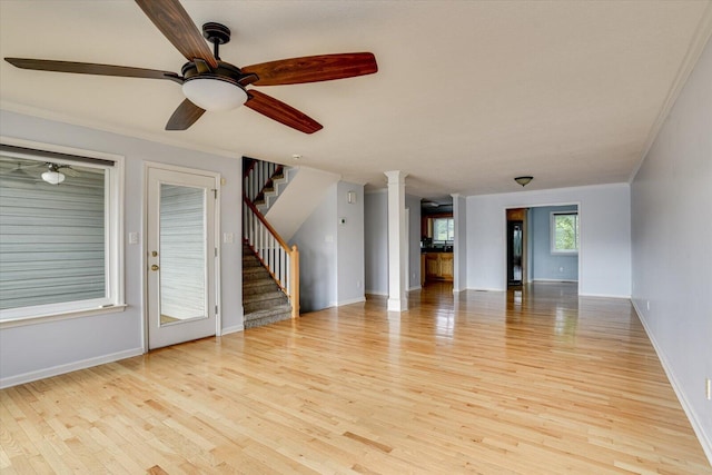 690 Riverfront Dr, Augusta, GA 30901 - unfurnished living room featuring baseboards, ceiling fan, stairway, and light wood-style floors