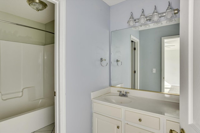 690 Riverfront Dr, Augusta, GA 30901 - bathroom with vanity, tile patterned flooring, and washtub / shower combination