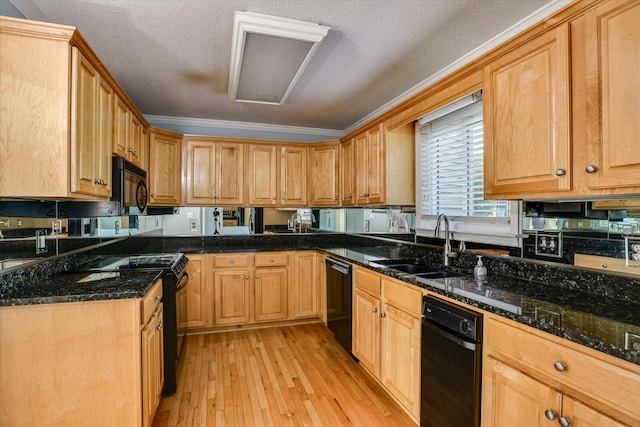690 Riverfront Dr, Augusta, GA 30901 - kitchen featuring light wood-type flooring, dark stone counters, a textured ceiling, a sink, and black appliances