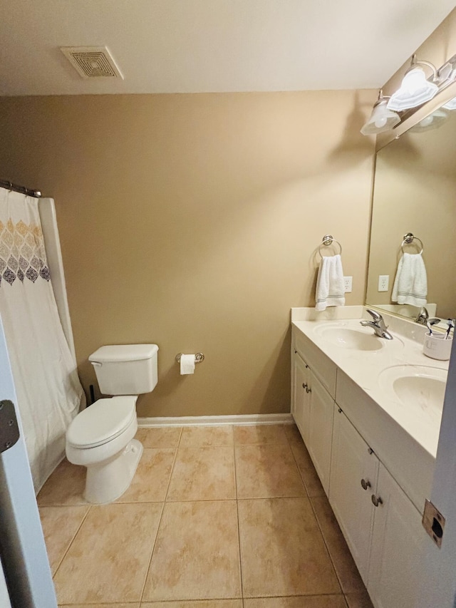 517 Avrett Ct, Evans, GA 30809 - full bathroom with tile patterned floors, double vanity, toilet, curtained shower, and baseboards