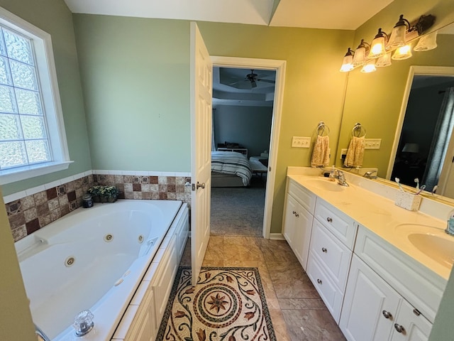 517 Avrett Ct, Evans, GA 30809 - ensuite bathroom with double vanity, a jetted tub, and ceiling fan