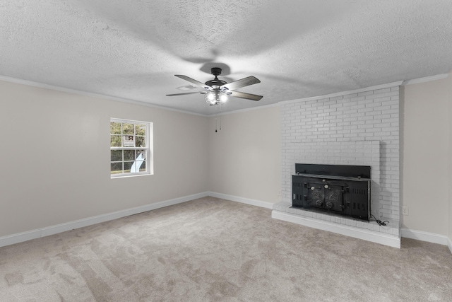 unfurnished living room with light carpet, a textured ceiling, ceiling fan, and ornamental molding