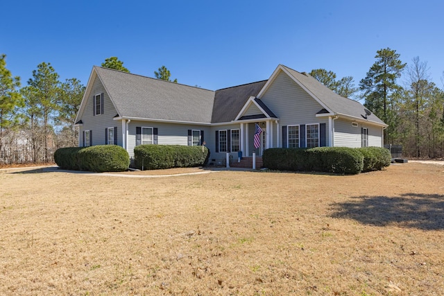 view of front of property with a front lawn