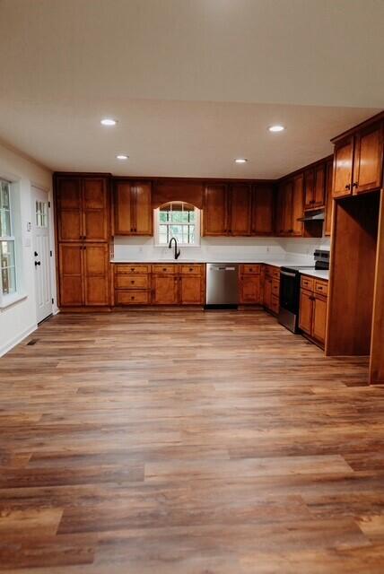 8643 Underwood Rd, Mitchell, GA 30820 - kitchen with range with electric cooktop, stainless steel dishwasher, light wood-style floors, a sink, and recessed lighting
