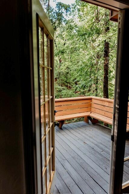 8643 Underwood Rd, Mitchell, GA 30820 - doorway to outside with wood-type flooring