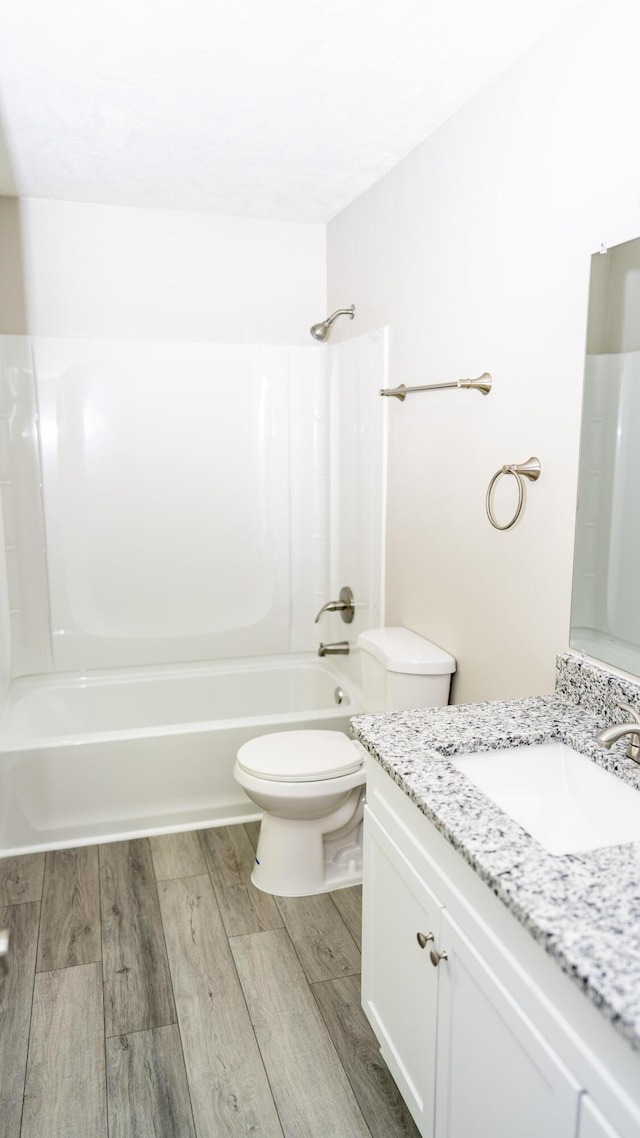 2154 Peppermint Pl, Augusta, GA 30906 - bathroom with shower / bath combination, vanity, toilet, and wood finished floors