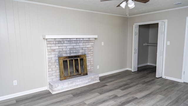 2154 Peppermint Pl, Augusta, GA 30906 - unfurnished living room featuring ceiling fan, wood finished floors, a fireplace, baseboards, and crown molding