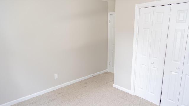 2154 Peppermint Pl, Augusta, GA 30906 - unfurnished bedroom featuring baseboards, a closet, and carpet