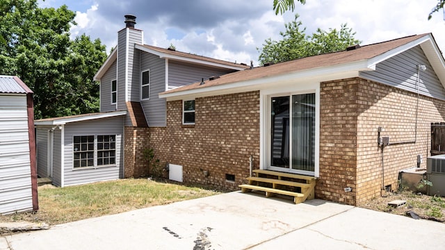 2154 Peppermint Pl, Augusta, GA 30906 - rear view of house with brick siding, crawl space, entry steps, and a patio area