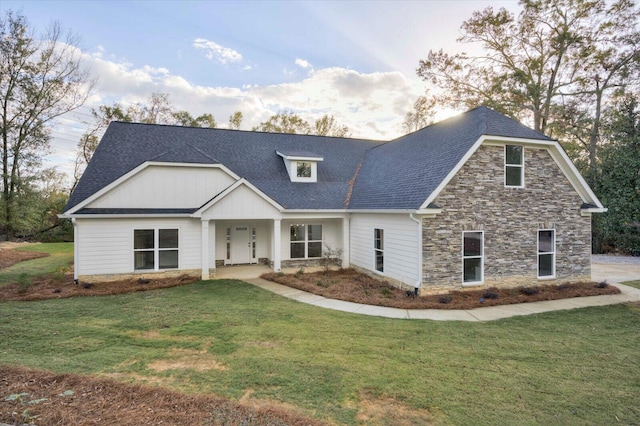 view of front of house with a front lawn