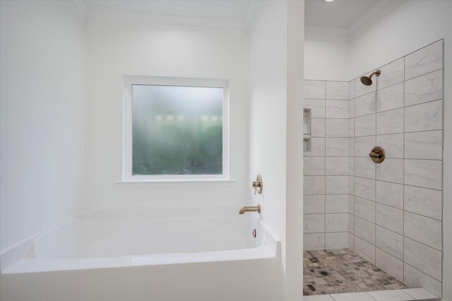 bathroom featuring separate shower and tub and ornamental molding