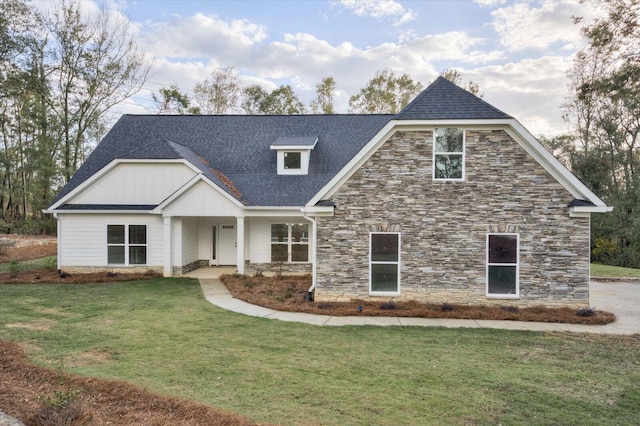 view of front of house with a front lawn