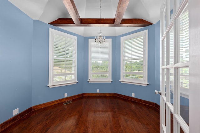 spare room with lofted ceiling with beams, dark hardwood / wood-style floors, and an inviting chandelier