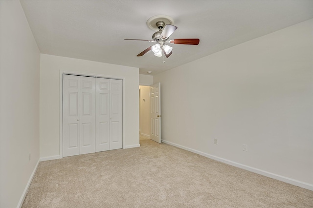 392 Sandleton Way, Evans, GA 30809 - unfurnished bedroom with light colored carpet, a closet, and a ceiling fan