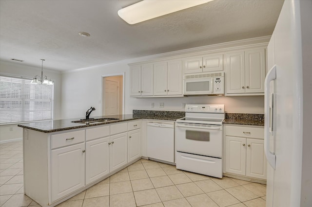 392 Sandleton Way, Evans, GA 30809 - kitchen with white appliances, a peninsula, white cabinetry, crown molding, and light tile patterned flooring