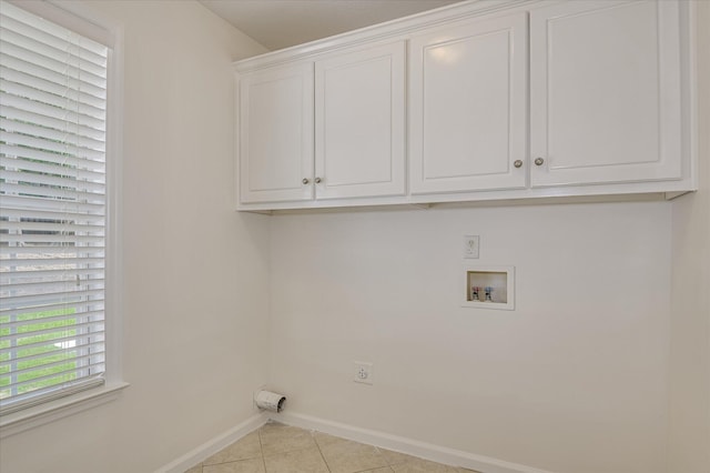 392 Sandleton Way, Evans, GA 30809 - laundry room featuring cabinet space, light tile patterned flooring, hookup for a washing machine, and hookup for an electric dryer