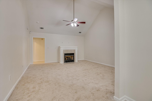 392 Sandleton Way, Evans, GA 30809 - unfurnished living room featuring ceiling fan, carpet floors, a tile fireplace, and high vaulted ceiling