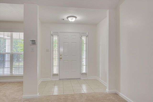 392 Sandleton Way, Evans, GA 30809 - foyer entrance featuring light colored carpet, light tile patterned floors, and plenty of natural light