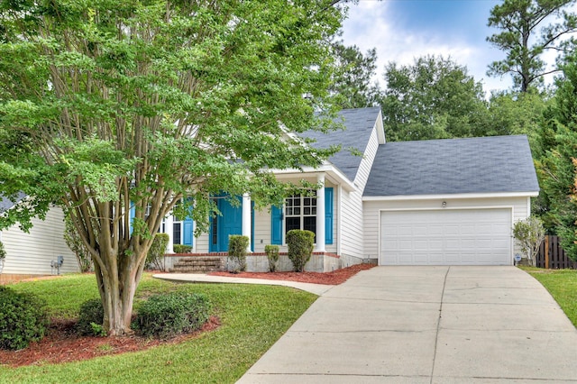 392 Sandleton Way, Evans, GA 30809 - view of front of home featuring a garage, driveway, roof with shingles, and a front yard