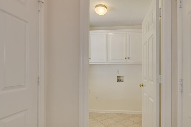 392 Sandleton Way, Evans, GA 30809 - washroom featuring washer hookup, light tile patterned flooring, and cabinet space