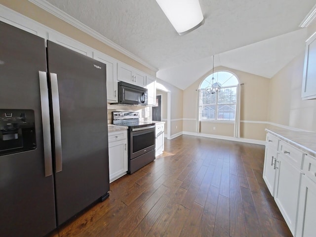 kitchen featuring white cabinetry, pendant lighting, dark hardwood / wood-style flooring, and appliances with stainless steel finishes