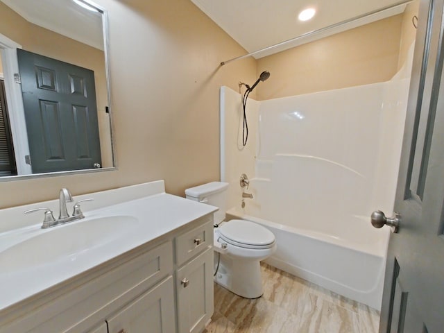 full bathroom featuring bathing tub / shower combination, vanity, and toilet