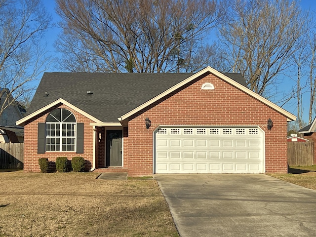 single story home featuring a garage