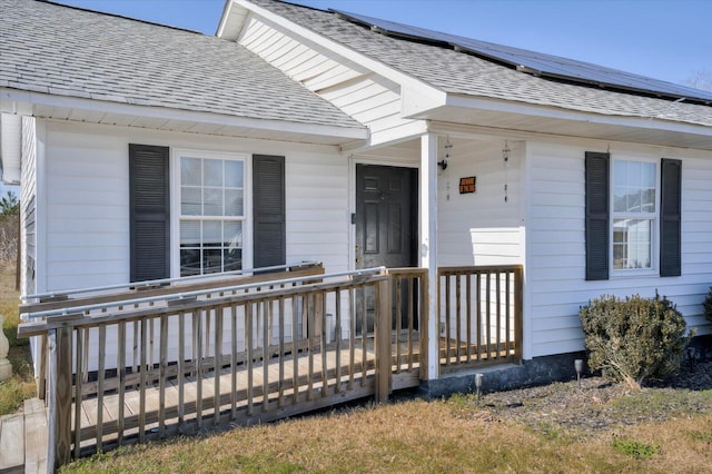 entrance to property featuring solar panels