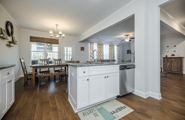 kitchen featuring kitchen peninsula, light stone countertops, white cabinets, ceiling fan with notable chandelier, and dishwasher